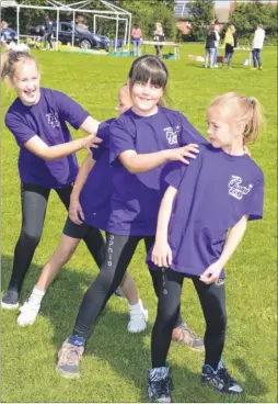  ?? Pictures: Paul Amos FM4000330 ?? Vikki’s Funky Feet members practise for the show at the community fun day run by Tesco