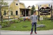  ?? WILSON RING — THE ASSOCIATED PRESS ?? Eduardo Rovetto poses outside his restaurant Piecasso Pizzeria & Lounge in Stowe, Vt., on Saturday.