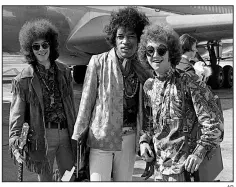  ?? AP ?? This Aug. 21, 1967, file photo shows bass guitarist Noel Redding (from left), guitarist Jimi Hendrix and drummer Mitch Mitchell of the Jimi Hendrix Experience at Heathrow airport in London.