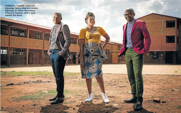  ??  ?? THREE’S A CHARM: Luphindo Ngxanga, Buhle Mda and Ntsika Ngxanga at Tetelo Secondary School in Soweto, where they started the band