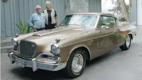  ?? ALYN EDWARDS/For Postmedia News ?? Ken Gurney and Eleanor Swan with their restored and modified ’57 Studebaker Golden Hawk.