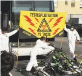  ?? David Streitfeld / New York Times ?? “Techsploit­ation” protesters use scooters to block worker shuttles.