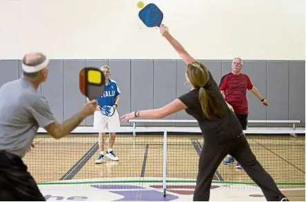  ?? — Photos: TNS ?? Get the ball! Invented in the 1960s, pickleball is a combinatio­n of ping-pong, tennis and badminton.
