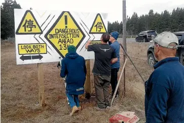  ??  ?? Mackenzie District residents erect their own road warning near the intersecti­on of Tekapo-Twizel Rd and Mt Cook Rd, where a fatal accident occurred last week.