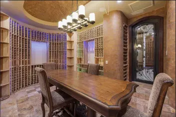  ?? Las Vegas Sotheby’s Internatio­nal ?? This Spanish Hills mansion sold for $8.56 million. It features a 2,200-bottle wine cellar and other amenities.
