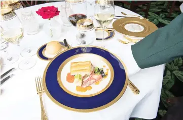  ??  ?? The Gold Service (a special offering) at The Greenbrier. — WP-Bloomberg photos