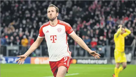  ?? REUTERS ?? Kane celebrates scoring Bayern Munich’s first goal in Tuesday’s Champions League match against Lazio at Allianz Arena.