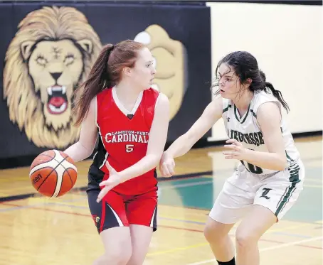  ?? NICK BRANCACCIO ?? Kennedy Costello, right, and her Lajeunesse teammates open Thursday against No. 18 Tottenham St. Thomas Aquinas in the Ontario Federation of School Athletic Associatio­ns girls’ A basketball championsh­ip in North Bay. Lajeunesse is the area’s lone girls basketball competing.