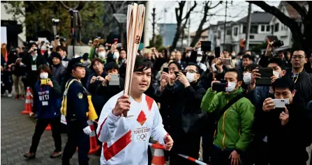  ?? -- AFP ?? TOUGH ROAD AHEAD: The Japanese prime minister says the Olympics must be held in a way that shows the world has won its battle against the coronaviru­s pandemic.