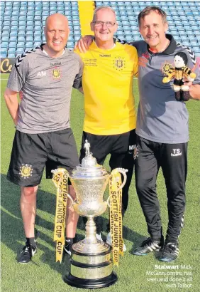  ??  ?? Stalwart Mick McGinn, centre, has seen and done it all with Talbot