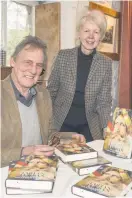  ??  ?? Warm welcome Author John Keay with his new book and Janey Lambie, chair of BOOKMARK