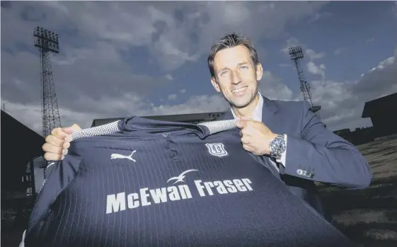  ??  ?? Neil Mccann is unveiled as the new – and this time permanent – manager of Dundee. It marks the beginning of his fourth stint at Dens Park.