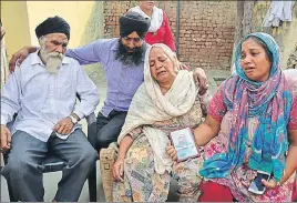  ?? AP PHOTO ?? Family members mourning the death of Harsimran Singh, one of the 27 Punjab workers whose bodies were found buried in Iraq, at Babowal village in Gurdaspur.