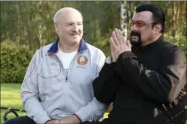  ??  ?? Belarusian President Alexander Lukashenko, left, meets with Hollywood actor and producer Steven Seagal in the presidenti­al residence of Drozdy, outside Minsk, Belarus.