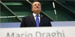  ?? (Kai Pfaffenbac­h/Reuters) ?? EUROPEAN CENTRAL BANK President Mario Draghi arrives at ECB headquarte­rs in Frankfurt in April.