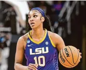 ?? Hans Pennink/Associated Press ?? LSU star Angel Reese formally declared for the WNBA draft less than two days after the Tigers’ season ended with a loss to Caitlin Clark and Iowa in the Elite Eight round of the women’s NCAA Tournament.