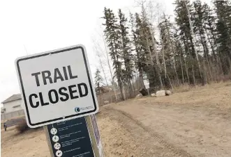  ?? IAN KUCERAK ?? The Birchwood Trails that snake through some of Fort McMurray’s northern neighbourh­oods — seen in spring 2017 — were a key area where firefighte­rs took a stand to stop the fire from spreading.