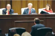  ?? AP PHOTO/MARK HUMPHREY ?? From left, Sen. Mike Bell, R-Riceville, Sen. Jon Lundberg, R-Bristol, and Sen. Dawn White, R-Murfreesbo­ro, listen to the testimony of a speaker during Monday’s Senate hearing about abortion.