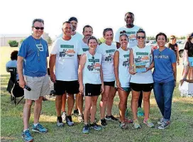  ?? [PHOTO PROVIDED] ?? Pacesetter Chair Chris Reen and United Way President and CEO Debby Hampton flank the Pacesetter champions team. Front row: Johnny Kitchen, Lauren Ballou, Amanda Wiens, Janna Humphrey, Laura Ashcraft. Back row: Troy Branstette­r, Greg Goldsmith and...