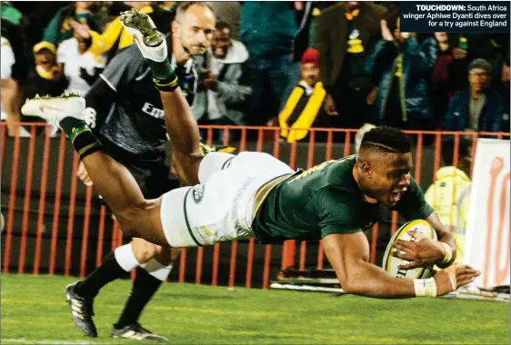  ??  ?? TOUCHDOWN: South Africa winger Aphiwe Dyanti dives over for a try against England