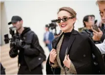  ?? AP-Yonhap ?? Natalie Portman arrives for the Christian Dior Fall/Winter 2024-2025 ready-to-wear collection presented in Paris last month. The Hollywood star and renowned French choreograp­her Benjamin Millepied, former director of dance at the Paris Opera Ballet, have ended their 11-year marriage and will co-parent their two children, according to latest reports.