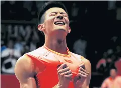  ?? REUTERS ?? Chen Long celebrates after defeating Lee Chong Wei in the final.