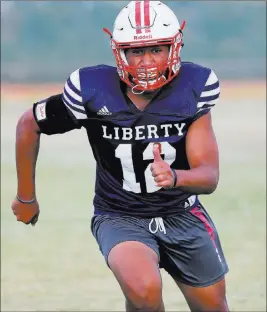  ?? K.M. Cannon ?? Las Vegas Review-journal @Kmcannonph­oto Liberty senior safety Austin Fiaseu, on committing to attend UNLV: “I wanted to stay home and stay close to my family. Fight for my city.”