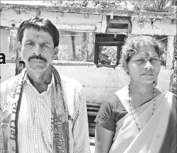  ?? — Washington Post photos by Annie Gowen and Simon Dawson ?? Kamalakar Mesta, left, and Rukma Mesta are still grieving the death of their son Paresh, 18, whose body was found in a pond two days after a dispute between Hindus and Muslims in the town of Honnavar.