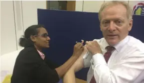  ??  ?? Dr Phillip Lee, MP for Bracknell, has had a flu jab and now wants others to get the same protection