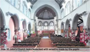  ??  ?? How St John’s Church looks bedecked with wreaths made by the pupils