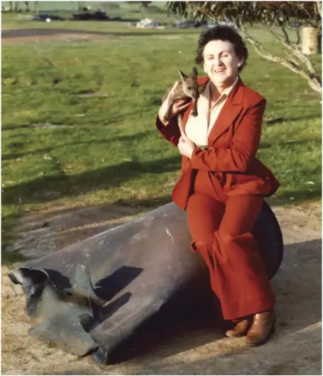  ?? CREDIT: ESPERANCE MUSEUM ?? Clare Burchard with Skylab debris that fell on her Merivale property.