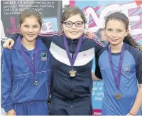  ??  ?? Good effort Maura Patterson (right) of St Brides Primary came third in the P6 girls javelin