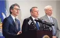  ?? STEPHANIE AMADOR/THE TENNESSEAN ?? U.S. Attorney Henry C. Leventis announces the indictment of U.S. Army soldier Korbein Schultz, from Fort Campbell, on charges of selling national defense secrets to China, at the Fred D. Thompson U.S. Courthouse and Federal Building in Nashville on Thursday. Standing next to Leventis are FBI Special Agent in Charge Douglas Depodesta and Special Agent Roy T. Cochran, a senior counterint­elligence executive with the Department of the Army.