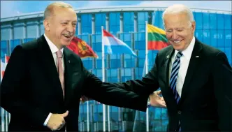  ??  ?? US President Joe Biden, right, is greeted by Turkey’s President Recep Tayyip Erdoğan during a Nato summit in Brussels on Monday