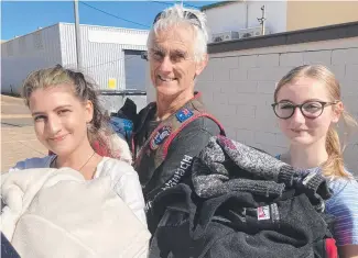 ?? Picture: Michael Nolan ?? HAND UP: Helping homeless residents are (from left) Homeless Outreach Services volunteer Bridget Noonan, Eureka Riders treasurer Paul Casey and volunteer Eden Munt.