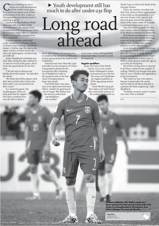  ?? Photo: VCG ?? Chinese midfielder Wei Shihao reacts to a Qatar goal during their group match at the AFC Under-23 Championsh­ip in Changzhou, East China’s Jiangsu Province on Monday.