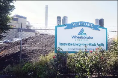  ?? Ned Gerard / Hearst Connecticu­t Media ?? Above and below, Wheelabrat­or Bridgeport plant in Bridgeport