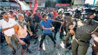  ?? ?? AT AN ANTI-GOVERNMENT DEMONSTRAT­ION in Colombo on September 24.