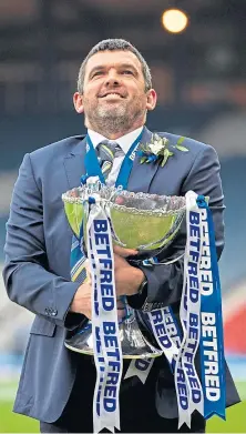  ??  ?? St Johnstone boss Callum Davidson with the cup.