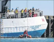  ??  ?? Activity was underway on the Lady Denise ll on May 8 as Yarmouth Harbour Tour passengers motored past.