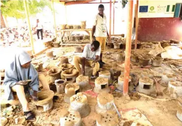  ??  ?? One of the girls being trained in producing the clay stove at Daura skills centre