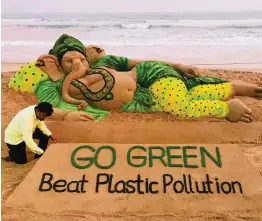  ?? — ASIAN AGE ?? Sand artist Sudarsan Pattnaik creates a 20- foot sand sculpture of Lord Ganesh at Puri beach in Odisha on Wednesday, the eve of Ganesh Chaturthi.