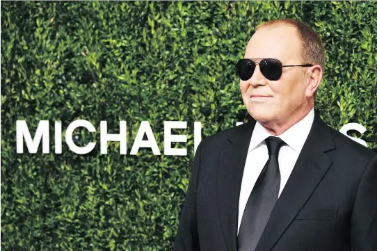  ?? DIMITRIOS KAMBOURIS/GETTY IMAGES ?? Michael Kors has been involved with the organizati­on God’s Love We Deliver since the 1980s and has expanded his efforts with his own initiative­s.