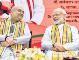  ?? SONU MEHTA/HT ?? BJP president Amit Shah and Prime Minister Narendra Modi at the meeting in Delhi.