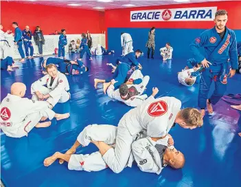  ??  ?? Action from the opening day at the new Gracie Barra Brazilian Jiu-Jitsu gym in Dundee. See Saturday’s Weekend Telegraph for story and more pictures.