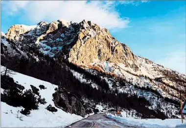  ?? MARY WINSTON NICKLIN/PHOTOS FOR THE WASHINGTON POST ?? After making our way up switchback­s through the Vrsic Pass, this was the view on the way down into the Soca Valley.