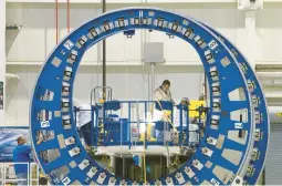  ?? MIKE SIEGEL/SEATTLE TIMES ?? Workers at the Boeing plant in North Charleston, South Carolina, fabricate and install airplane systems for the rear-fuselage sections of the 787 Dreamliner.