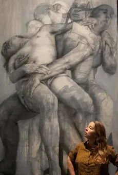  ?? Clara Vannucci, © The New York Times Co. ?? “The Mothers,” by Jenny Saville at the Museo degli Innocenti in Florence, Italy.