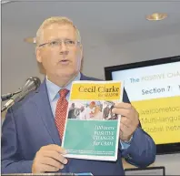  ?? CHRIS SHANNON/CAPE BRETON POST ?? Cape Breton Regional Municipali­ty Mayor Cecil Clarke holds up his reelection document with 100 promises he’ll undertake as mayor over the next four years if re-elected. Municipal elections will be held across the province on Oct. 15.