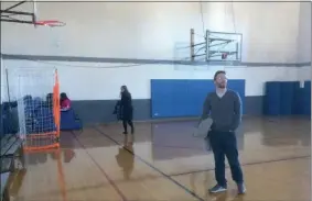  ?? EVAN BRANDT — MEDIANEWS GROUP ?? Lydia Messinger, left, and Matthew Hovey inspect the gym at the Ricketts Community Center during a recent visit.